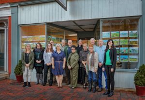 image of agents and staff of Lexington Real Estate Connection in front of the office on Main Street